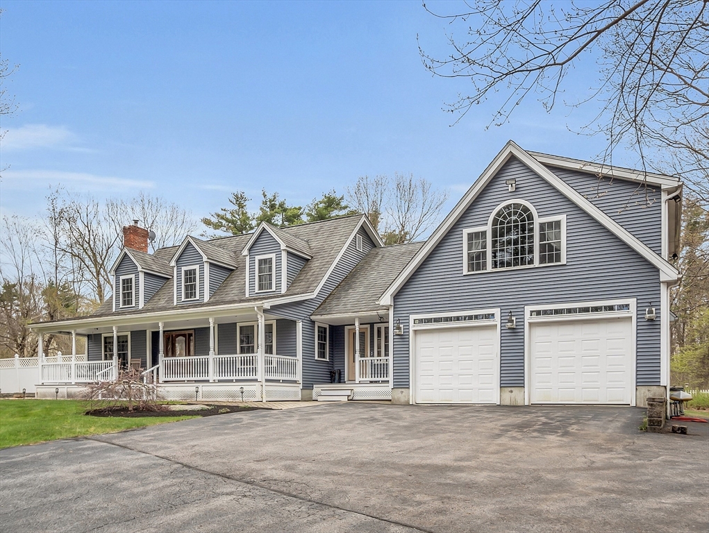 23 Harrington Road Westminster, MA 01473 - Photo 2 of 42 a front view of a house with a garden and trees