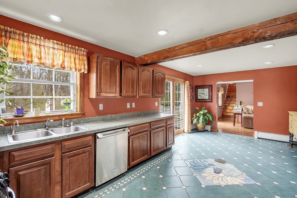 23 Harrington Road Westminster, MA 01473 - Photo 21 of 42 a large kitchen with granite countertop a large counter top and sink