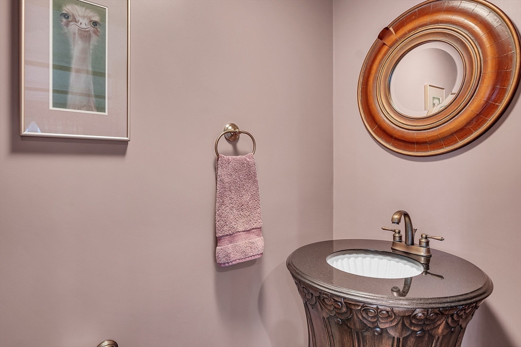 23 Harrington Road Westminster, MA 01473 - Photo 28 of 42 a bathroom with a sink and a mirror