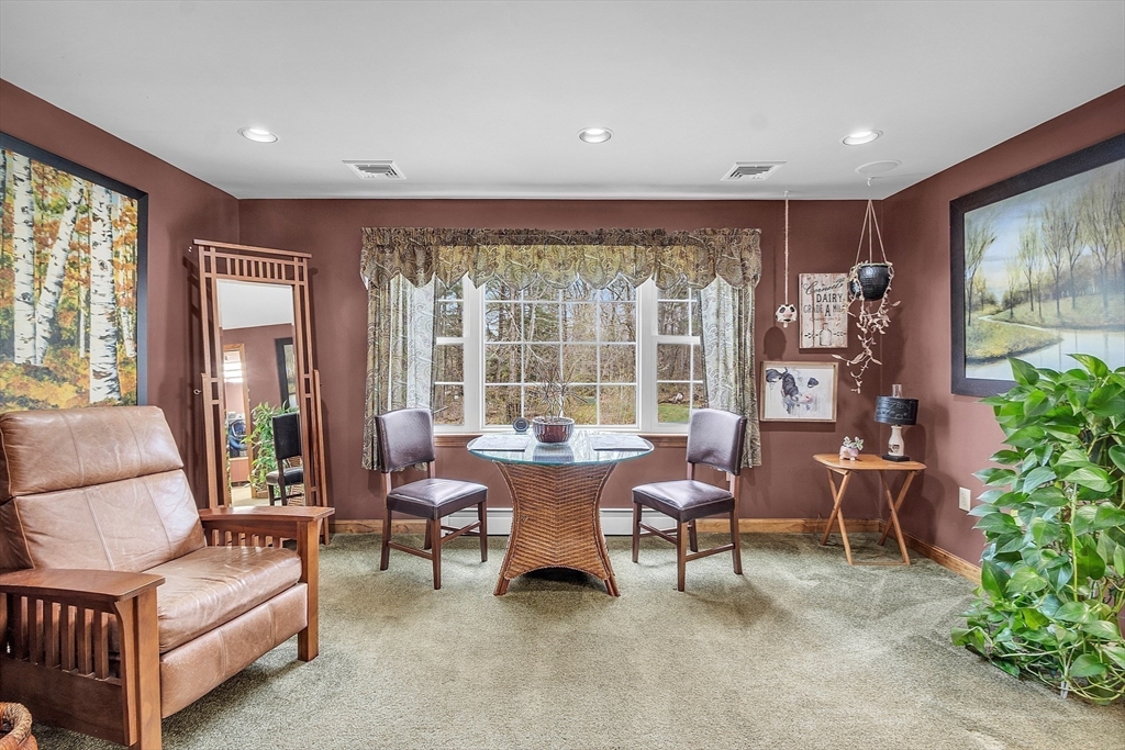 23 Harrington Road Westminster, MA 01473 - Photo 30 of 42 a living room with furniture and a large window