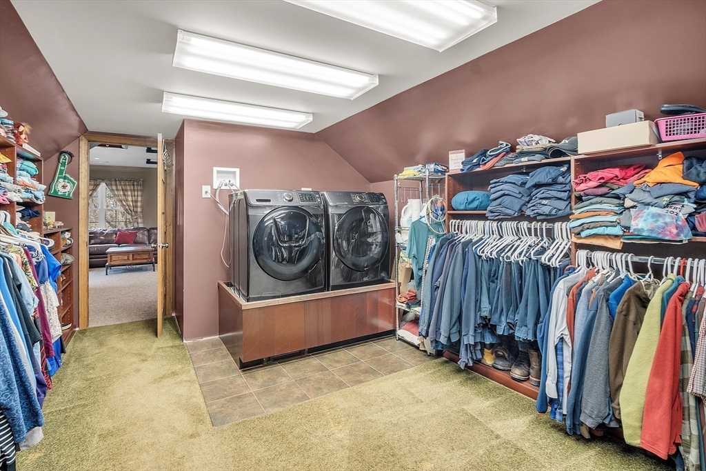 23 Harrington Road Westminster, MA 01473 - Photo 31 of 42 a view of walk in closet with clothes and shoes
