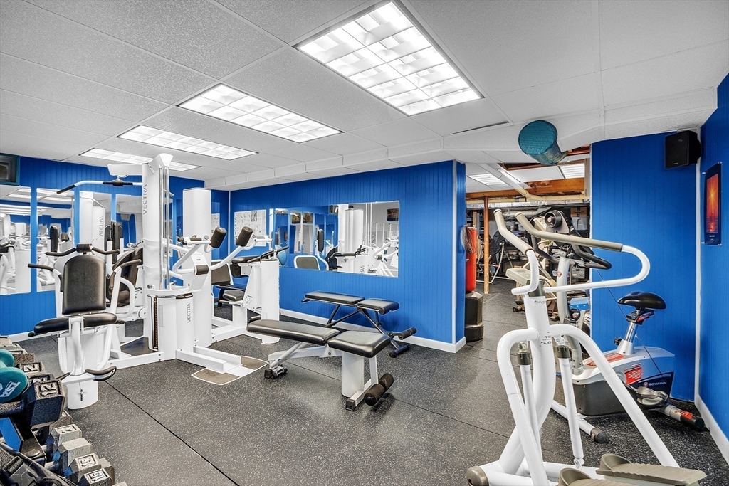 23 Harrington Road Westminster, MA 01473 - Photo 35 of 42 a view of a room with gym equipment