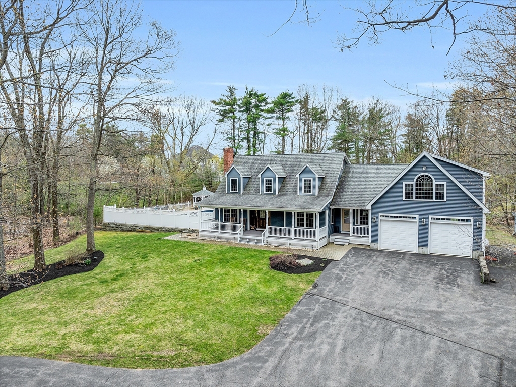23 Harrington Road Westminster, MA 01473 - Photo 4 of 42 front view of house with a yard