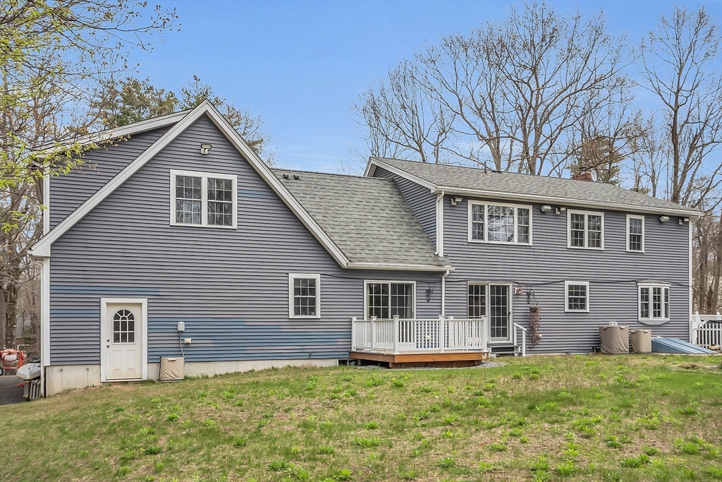 23 Harrington Road Westminster, MA 01473 - Photo 9 of 42 a front view of a house with a yard