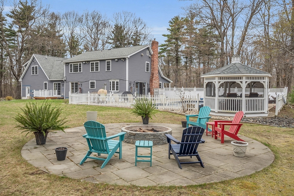 23 Harrington Road Westminster, MA 01473 - Photo 10 of 42 a view of a house with backyard and sitting area