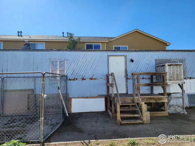 a view of a chairs and table on the wooden floor