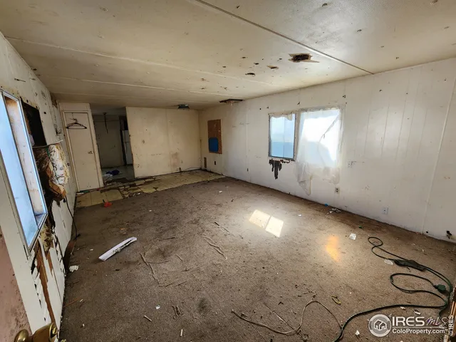 a view of a storage & utility room with a sink