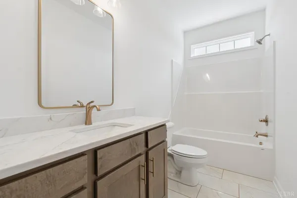 a view of a backyard with table and chairs
