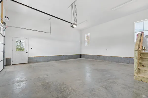 a view of house with a snow in the background