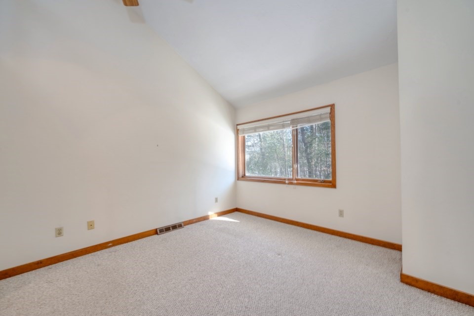 305 Centre Ln., Unit 305 Walpole, MA 02081 - Photo 19 of 23 an empty room with a window
