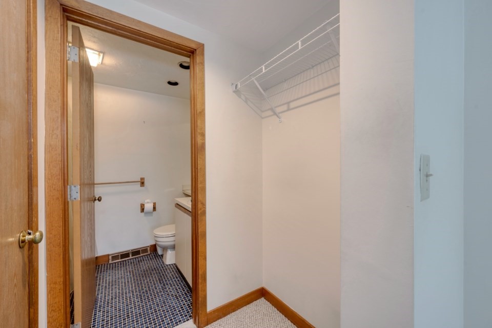 305 Centre Ln., Unit 305 Walpole, MA 02081 - Photo 20 of 23 a bathroom with a shower and a toilet