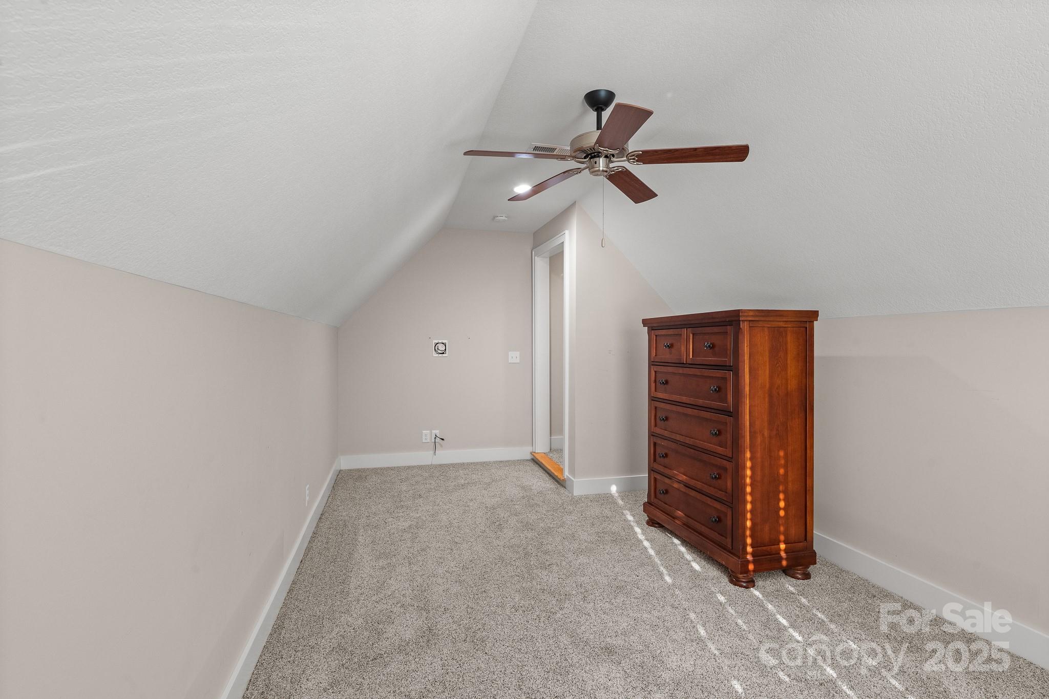 235 Windstone Drive Fletcher, NC 28732 - Photo 31 of 40 an empty room with a ceiling fan
