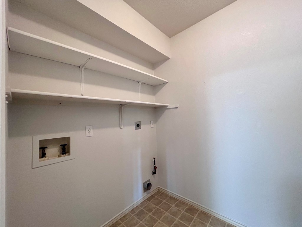 716 Leann Lane Cedar Park, TX 78613 - Photo 11 of 29 a view of an empty walk in closet
