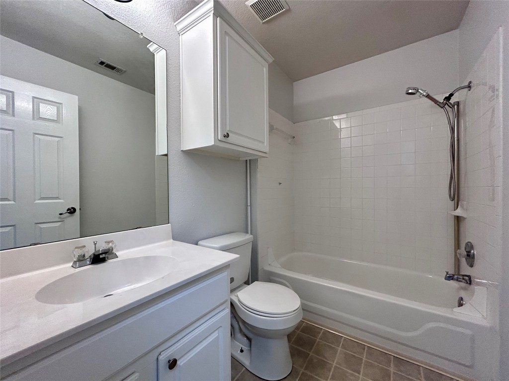 716 Leann Lane Cedar Park, TX 78613 - Photo 19 of 29 a bathroom with a sink toilet and shower