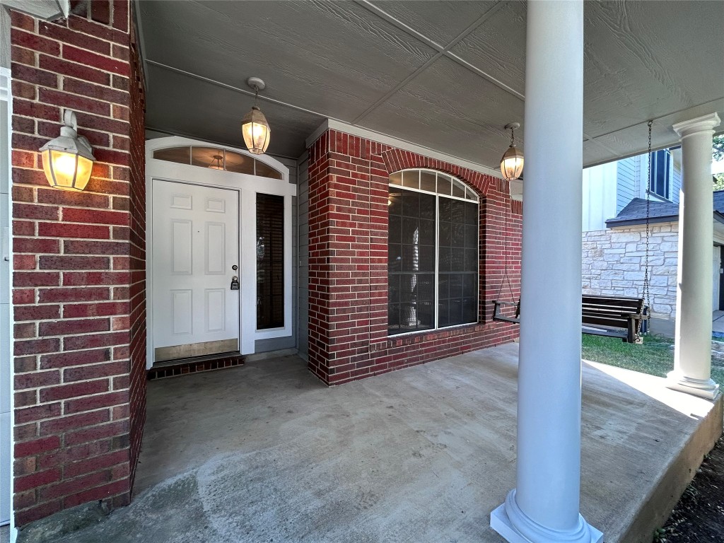 716 Leann Lane Cedar Park, TX 78613 - Photo 2 of 29 a view of a brick house with entryway doors