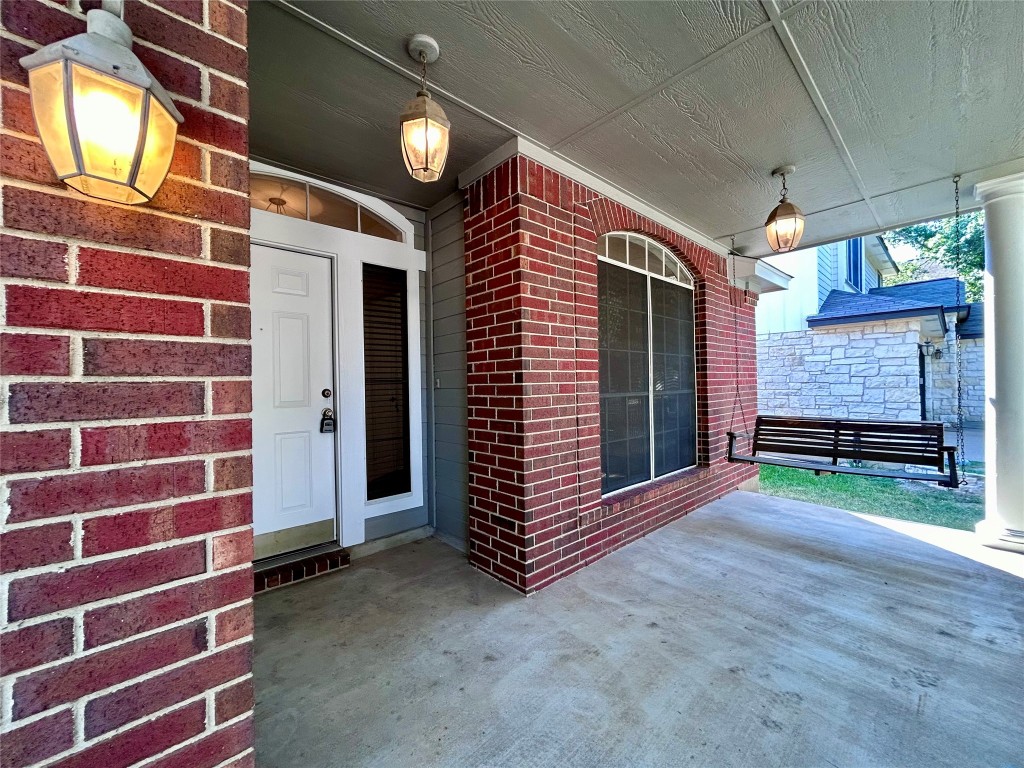 716 Leann Lane Cedar Park, TX 78613 - Photo 3 of 29 a view of a room with brick walls