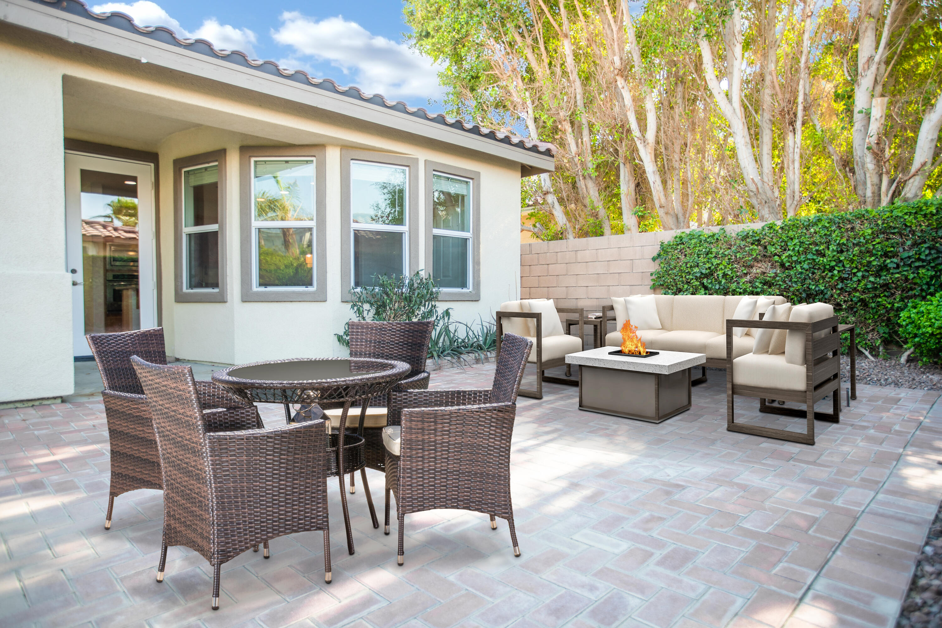 83304 Stagecoach Road Indio, CA 92203 - Photo 3 of 48 a view of a patio with table and chairs and potted plants