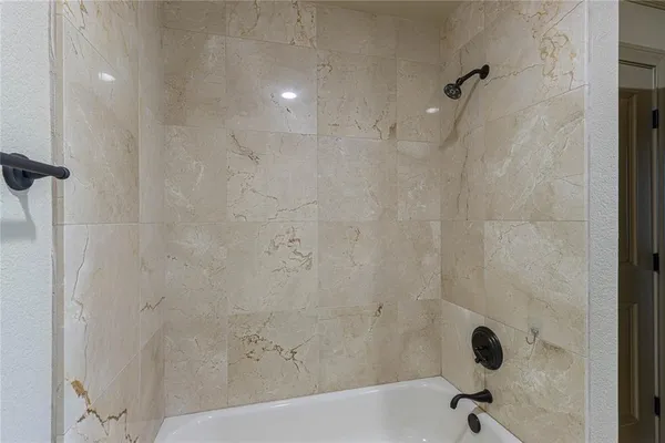 a bathroom with a bathtub