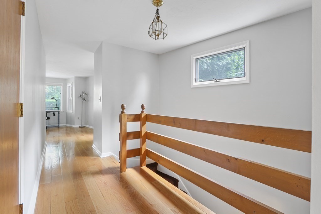 306 Tappan Street, Unit B Brookline, MA 02445 - Photo 11 of 35 a view of entryway with wooden floor
