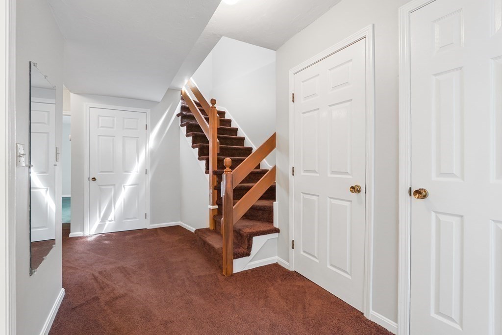 306 Tappan Street, Unit B Brookline, MA 02445 - Photo 13 of 35 a view of an entryway with staircase