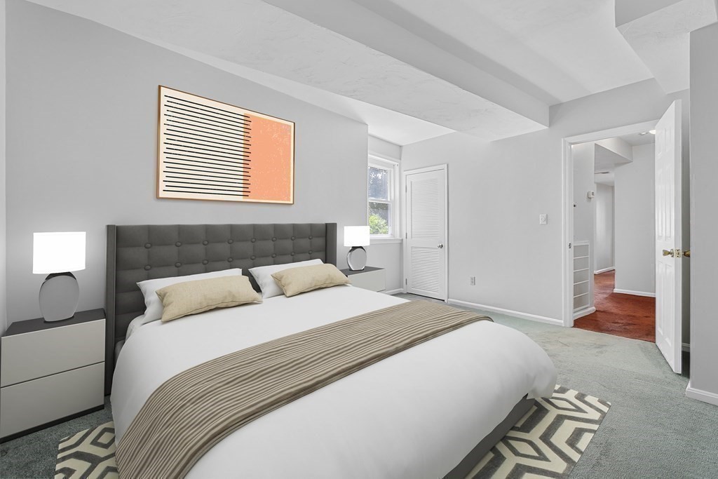 306 Tappan Street, Unit B Brookline, MA 02445 - Photo 19 of 35 a bedroom with a bed and a dresser