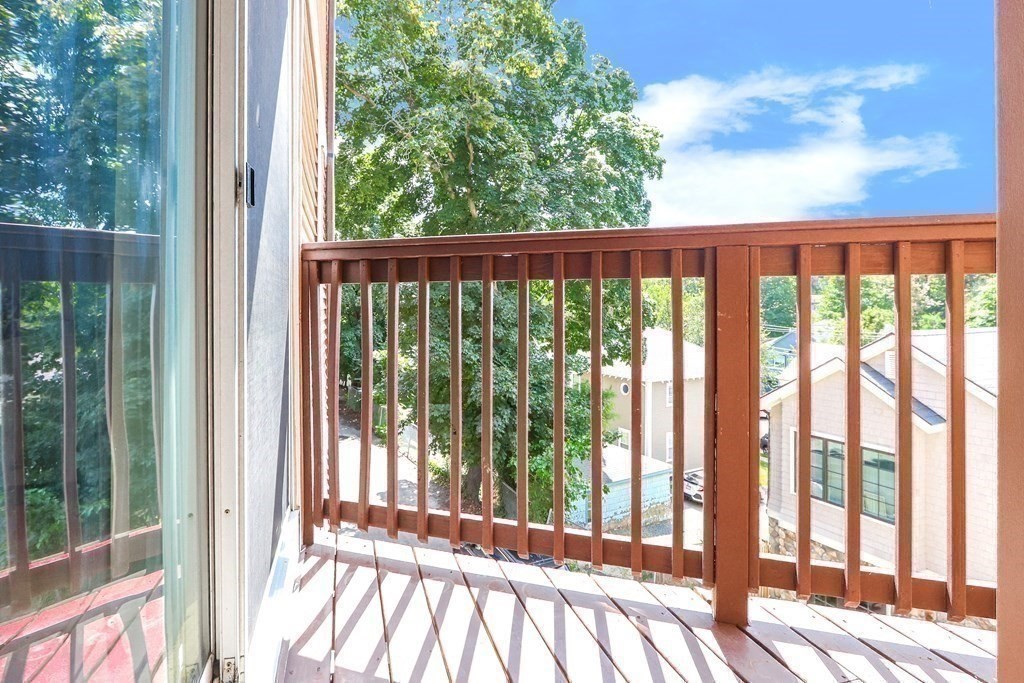 306 Tappan Street, Unit B Brookline, MA 02445 - Photo 26 of 35 a view of a large window with an outdoor space