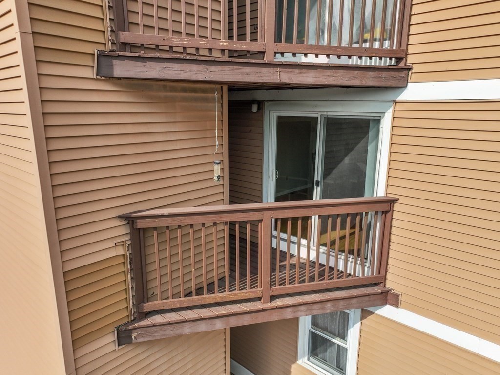 306 Tappan Street, Unit B Brookline, MA 02445 - Photo 28 of 35 a view of a balcony with furniture
