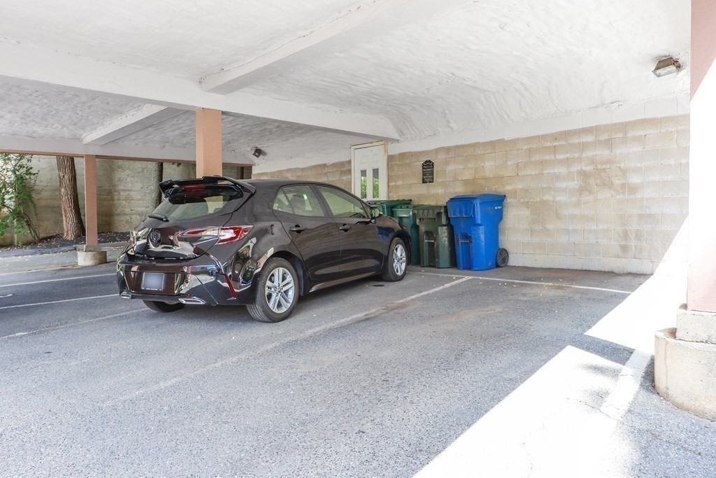 306 Tappan Street, Unit B Brookline, MA 02445 - Photo 29 of 35 a car parked in garage