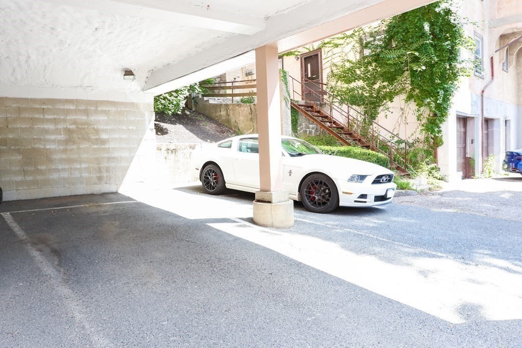 306 Tappan Street, Unit B Brookline, MA 02445 - Photo 30 of 35 a view of car parked on the side of a street