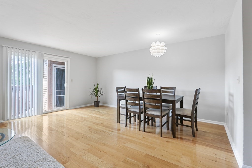 306 Tappan Street, Unit B Brookline, MA 02445 - Photo 4 of 35 a dining room with furniture and wooden floor