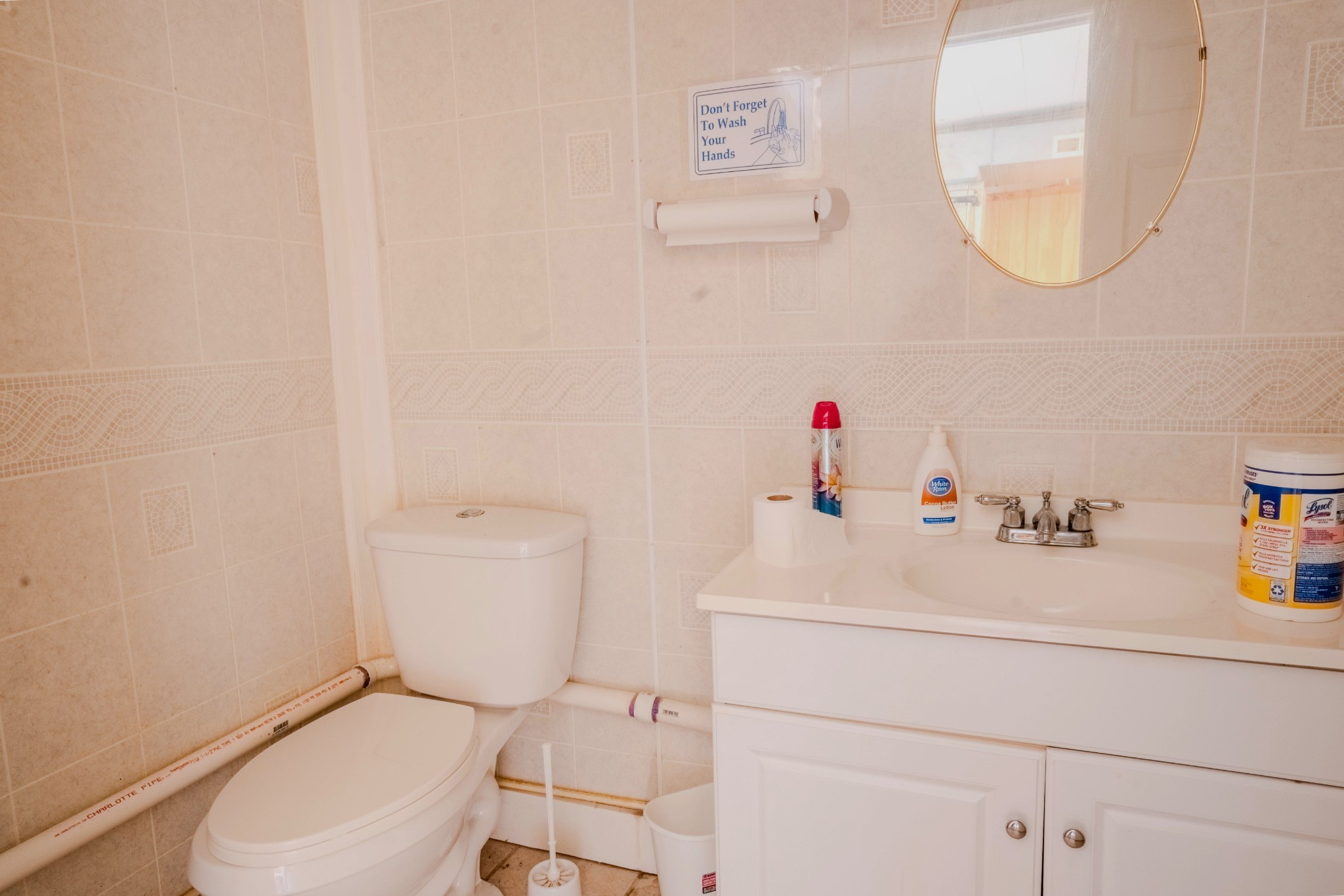 721 State Highway 99 Waynesboro, TN 38485 - Photo 17 of 24 a bathroom with a sink toilet and a mirror