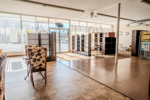 a view of staircase with a floor to ceiling window