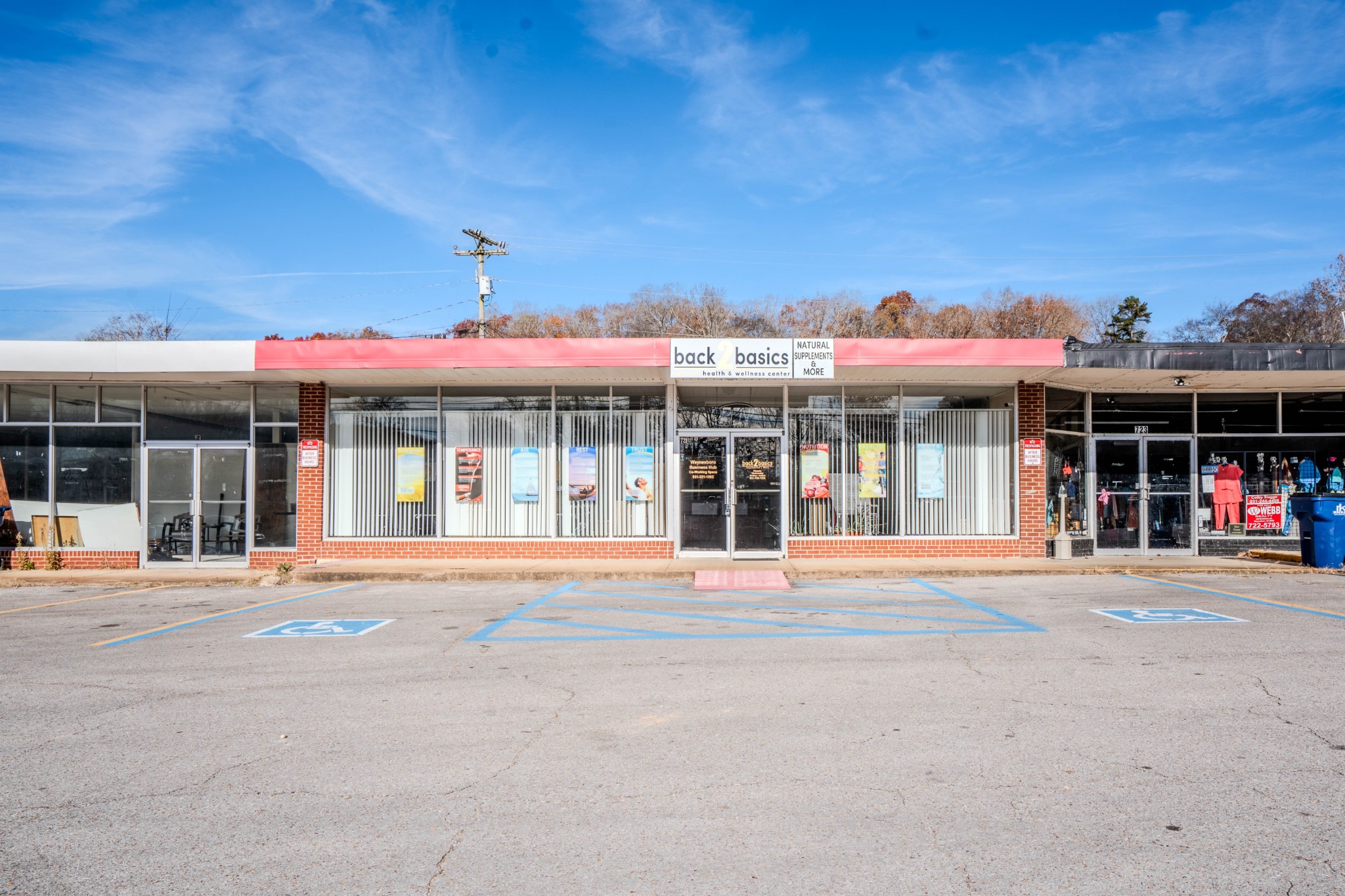 721 State Highway 99 Waynesboro, TN 38485 - Photo 2 of 24 a front view of a building with a garden