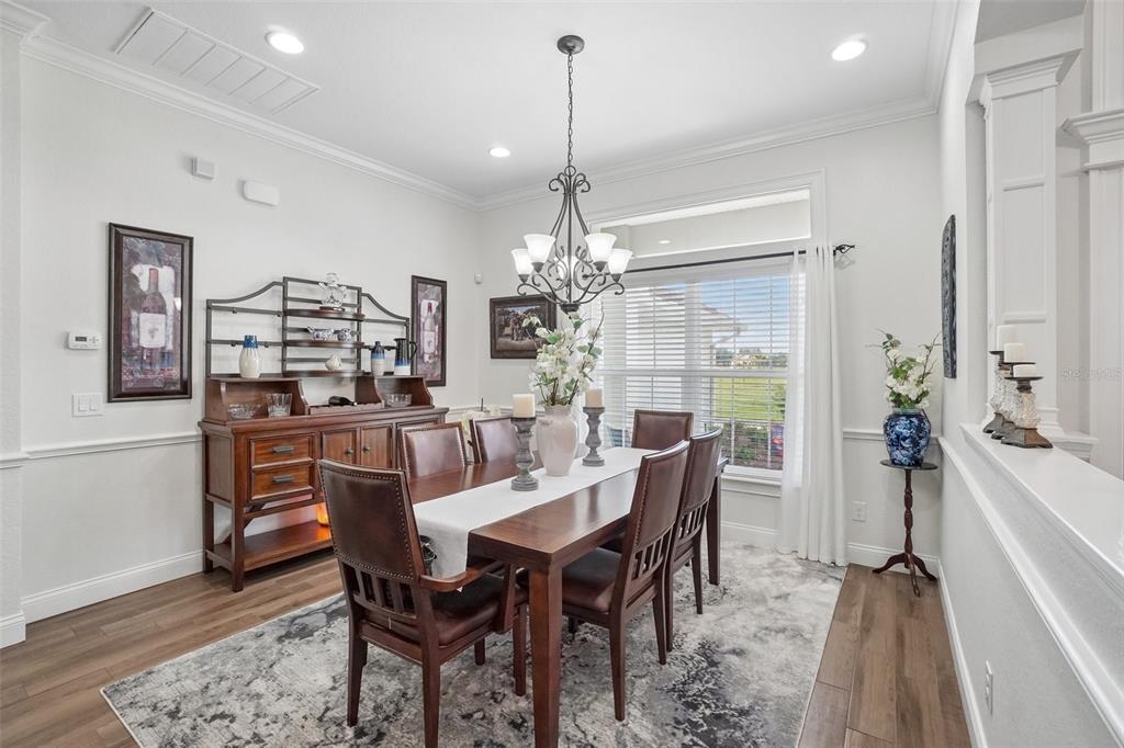 3934 Connersville Road Bartow, FL 33830 - Photo 18 of 81 a view of a dining room with furniture window and wooden floor