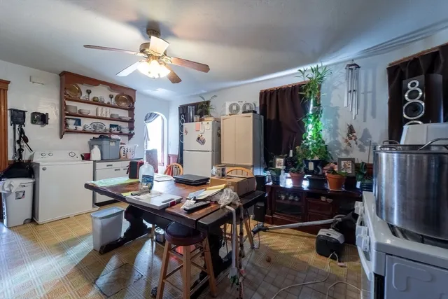 a view of a workspace with furniture