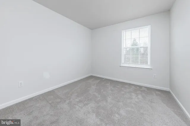 a bathroom with a sink toilet vanity and shower