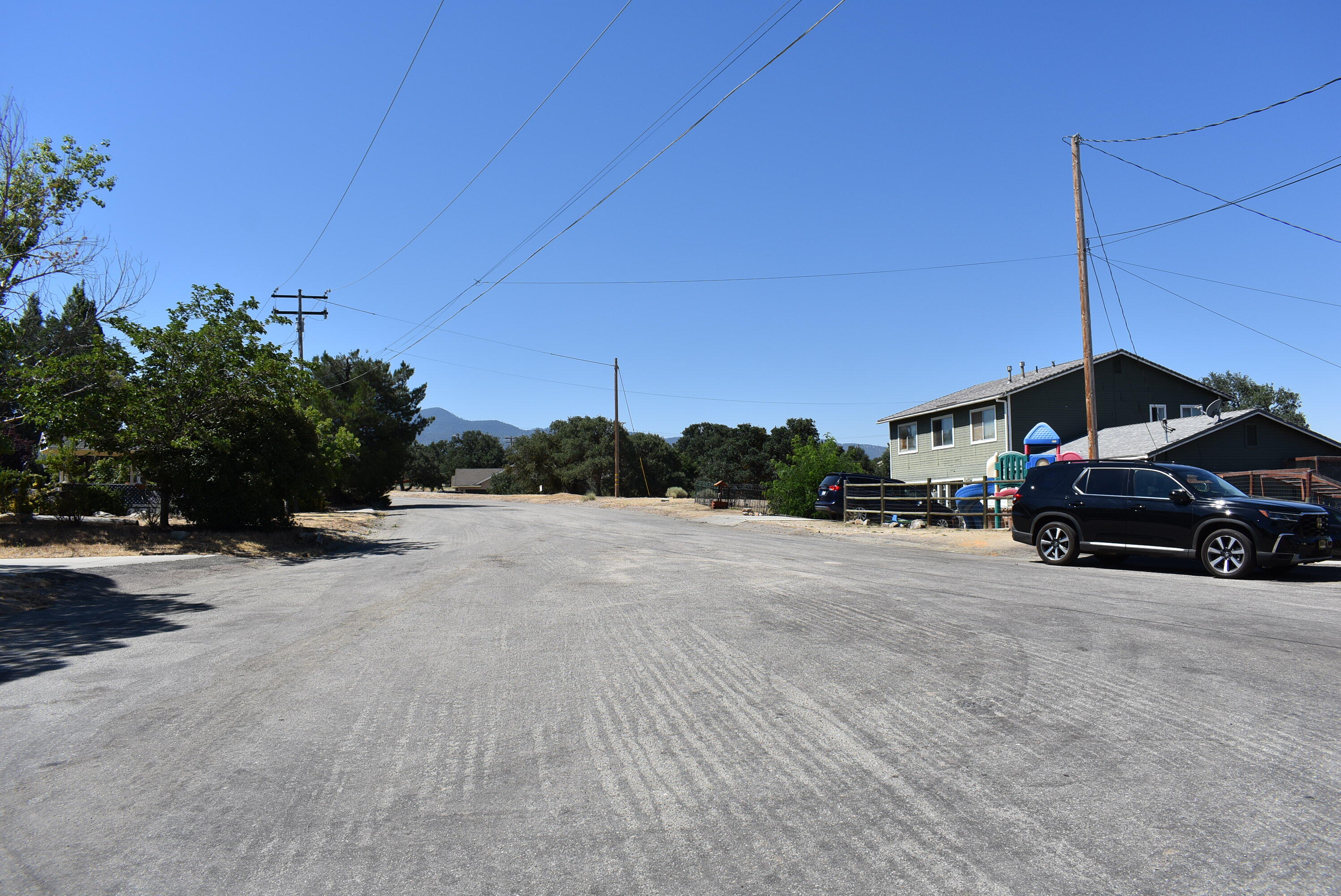 22948 Rim Way Tehachapi, CA 93561 - Photo 3 of 16 a car parked on the side of the road