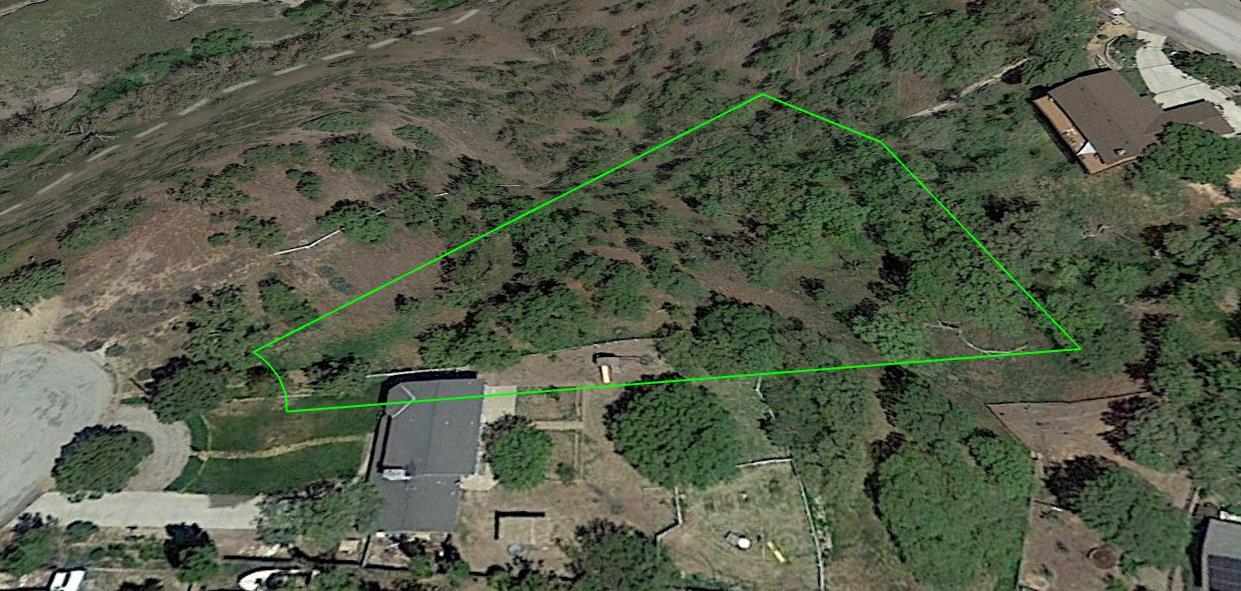 22948 Rim Way Tehachapi, CA 93561 - Photo 8 of 16 an aerial view of a house with a yard