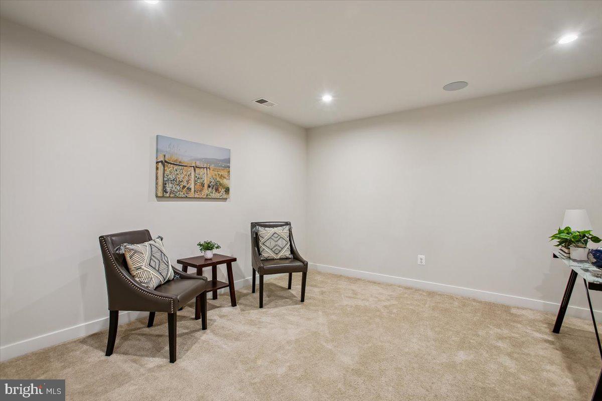 2105 Hemlock Bay Road Dumfries, VA 22026 - Photo 22 of 48 a view of work space with furniture and a potted plant