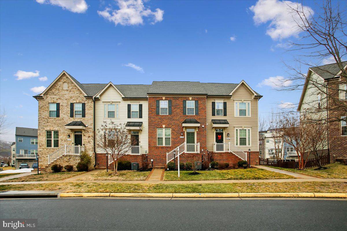 2105 Hemlock Bay Road Dumfries, VA 22026 - Photo 27 of 48 a view of a house with swimming pool next to a yard