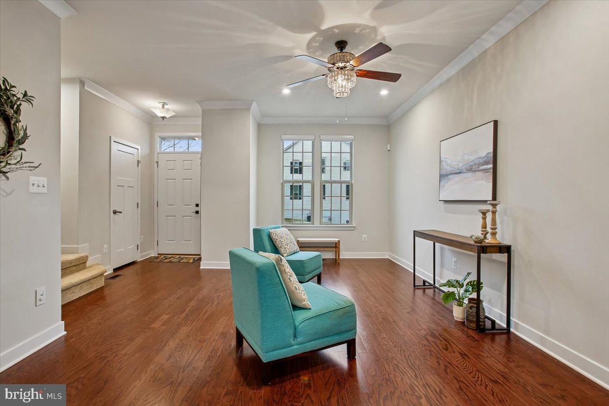2105 Hemlock Bay Road Dumfries, VA 22026 - Photo 3 of 48 a living room with furniture and a wooden floor