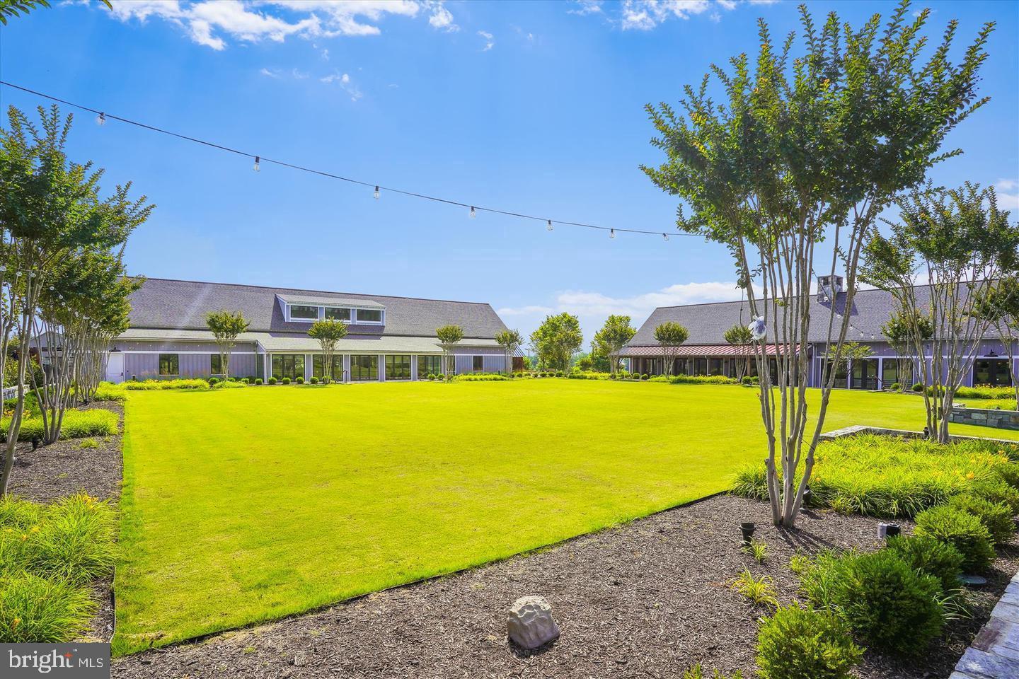2105 Hemlock Bay Road Dumfries, VA 22026 - Photo 36 of 48 a view of a swimming pool with an outdoor space and seating area