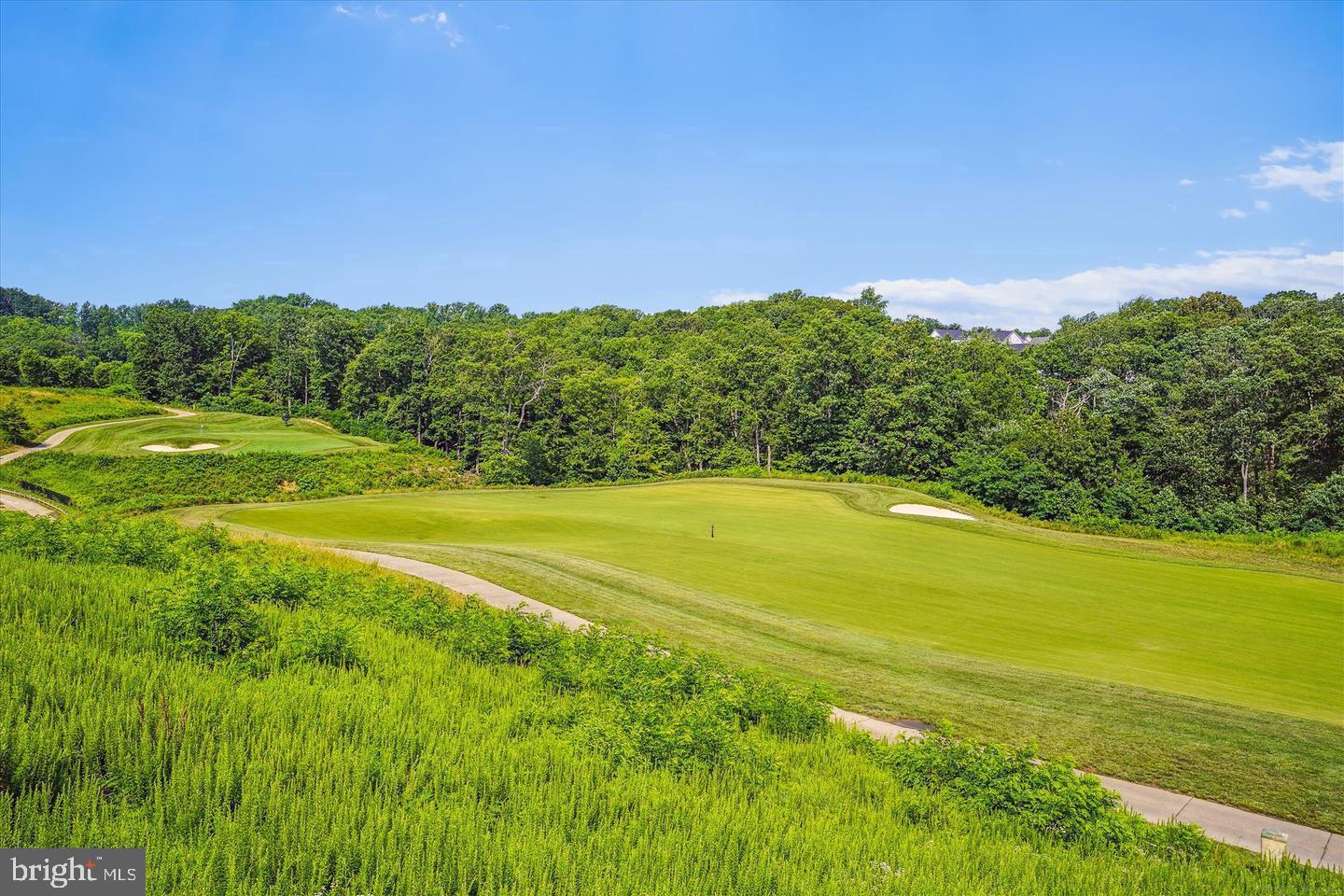2105 Hemlock Bay Road Dumfries, VA 22026 - Photo 46 of 48 a view of a big yard with swimming pool and green space