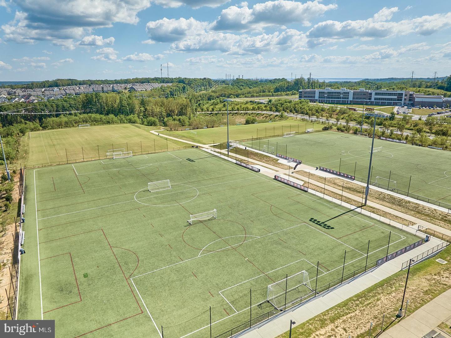 2105 Hemlock Bay Road Dumfries, VA 22026 - Photo 47 of 48 a view of an outdoor space and tennis court