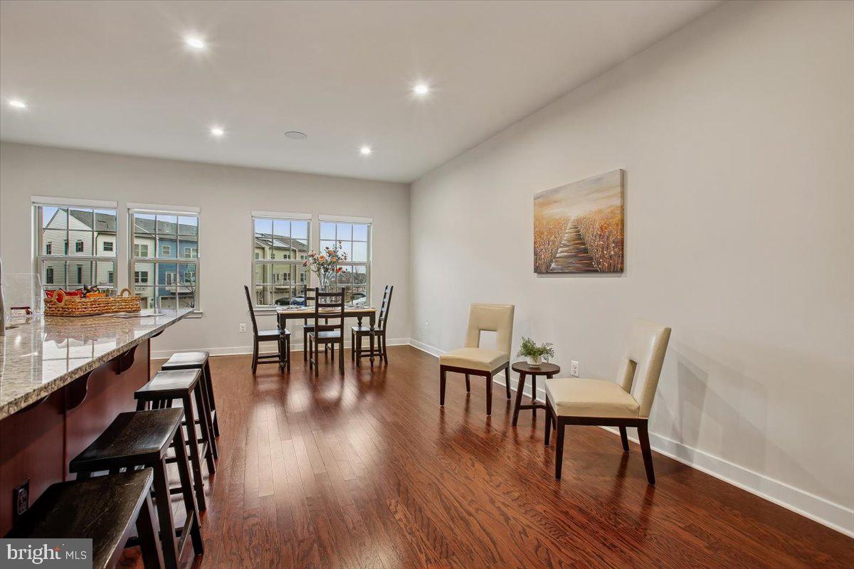 2105 Hemlock Bay Road Dumfries, VA 22026 - Photo 6 of 48 a view of a dining room with furniture window and wooden floor