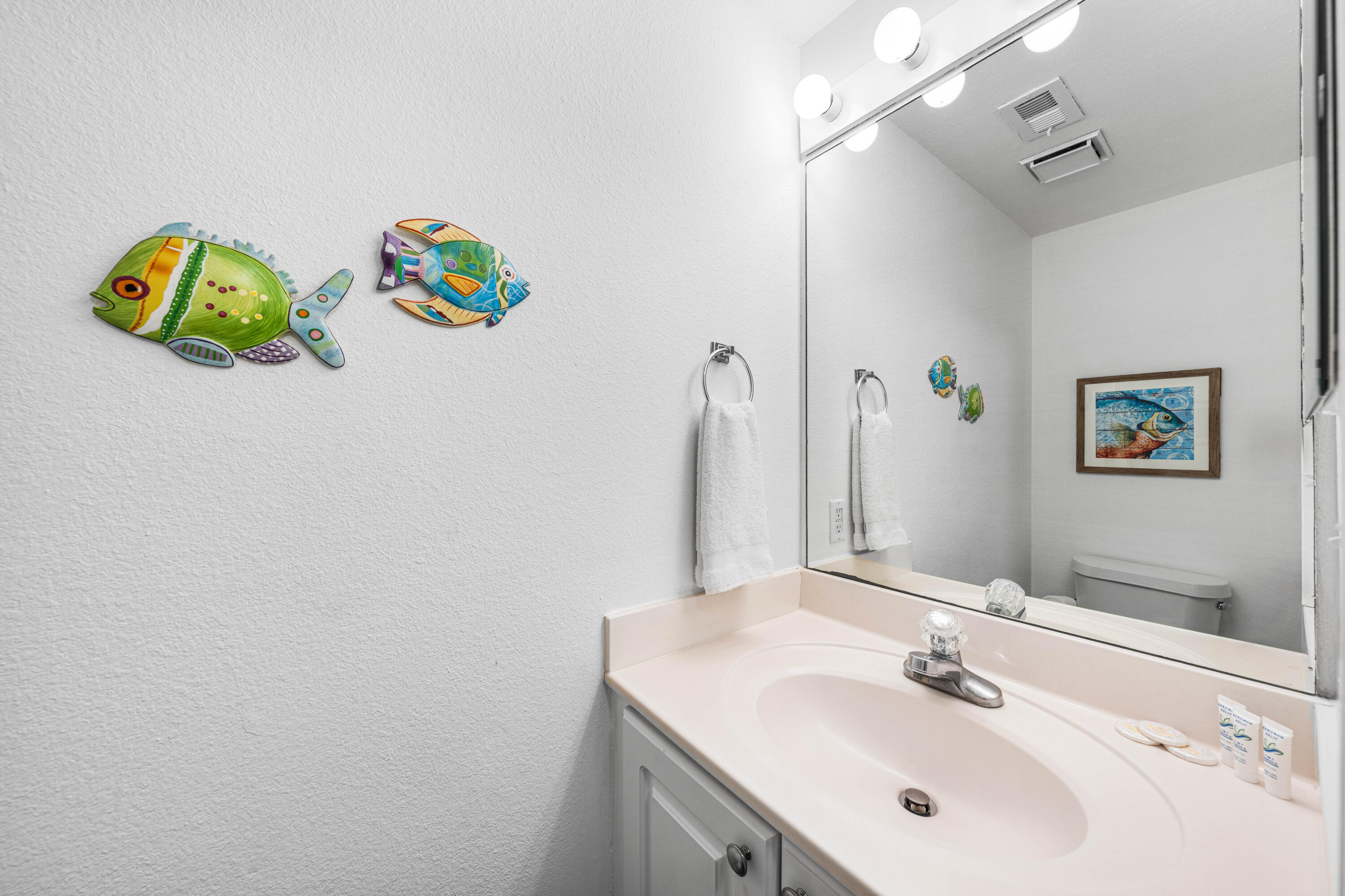 145 Spires Lane, Unit 306 Santa Rosa Beach, FL 32459 - Photo 15 of 35 a bathroom with a sink mirror and vanity