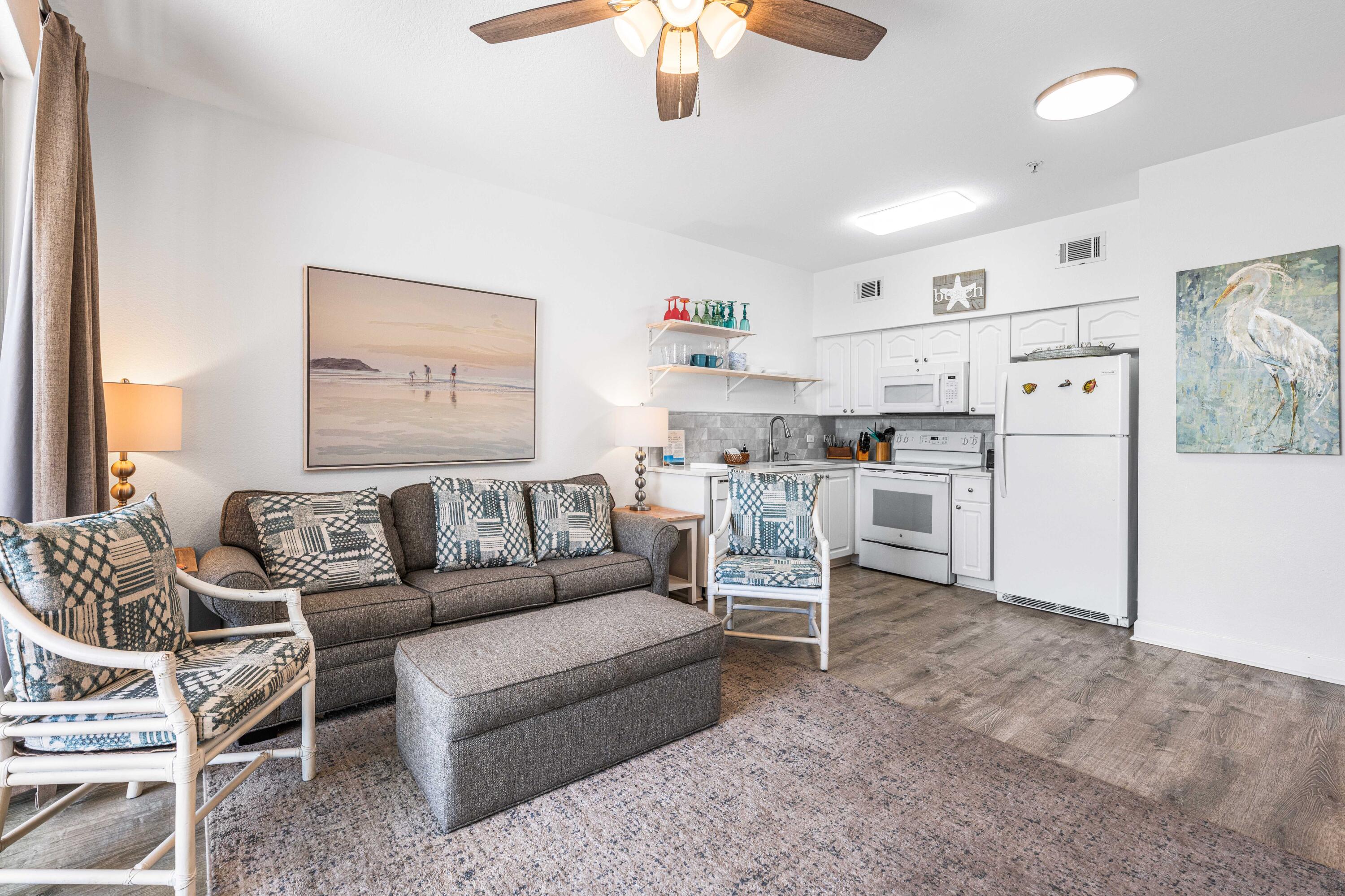 145 Spires Lane, Unit 306 Santa Rosa Beach, FL 32459 - Photo 16 of 35 a living room with furniture and kitchen view