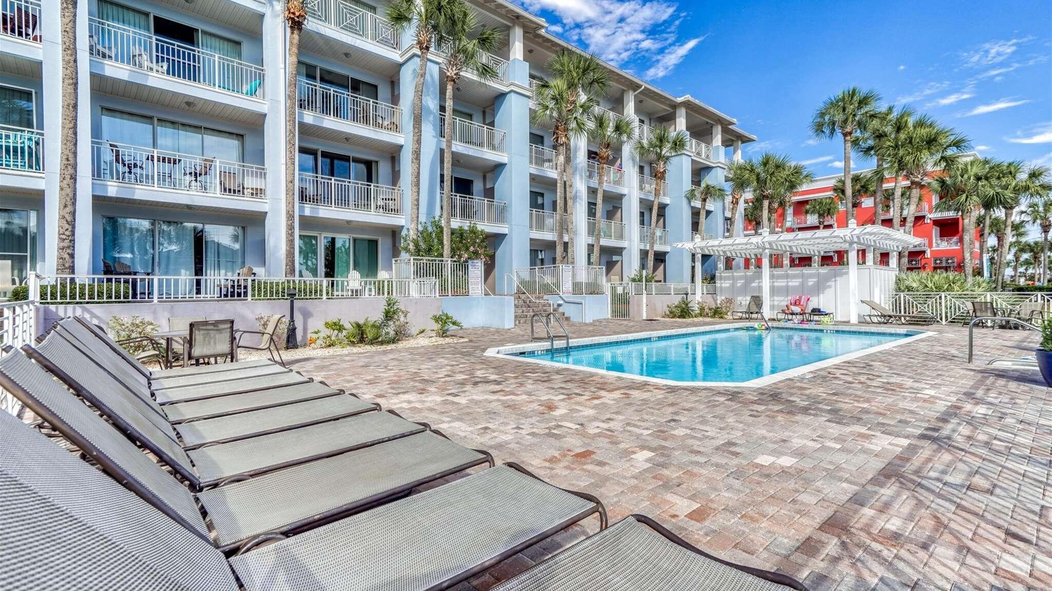 145 Spires Lane, Unit 306 Santa Rosa Beach, FL 32459 - Photo 27 of 35 a view of a building with a swimming pool