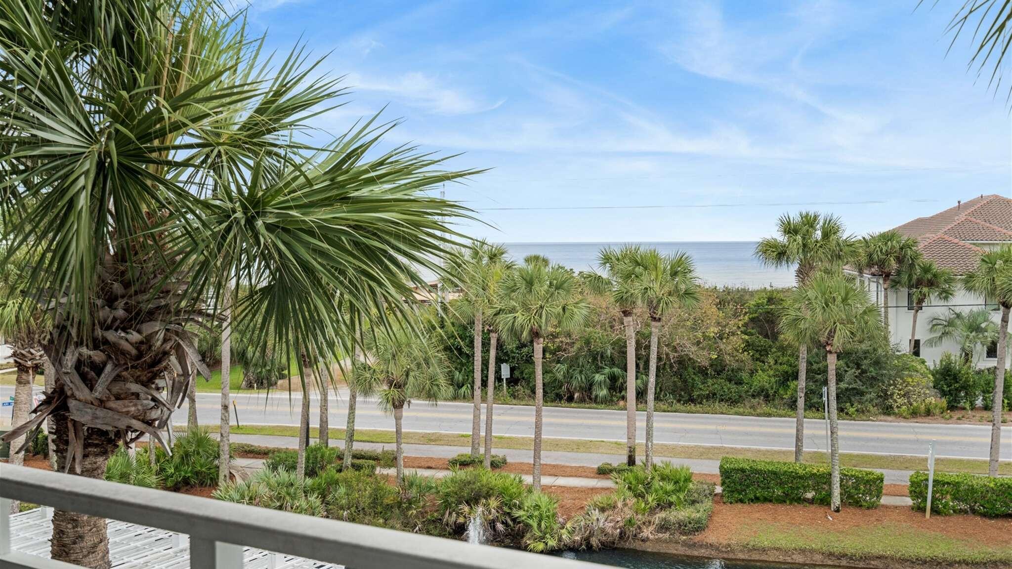 145 Spires Lane, Unit 306 Santa Rosa Beach, FL 32459 - Photo 31 of 35 a view of a backyard and a tree
