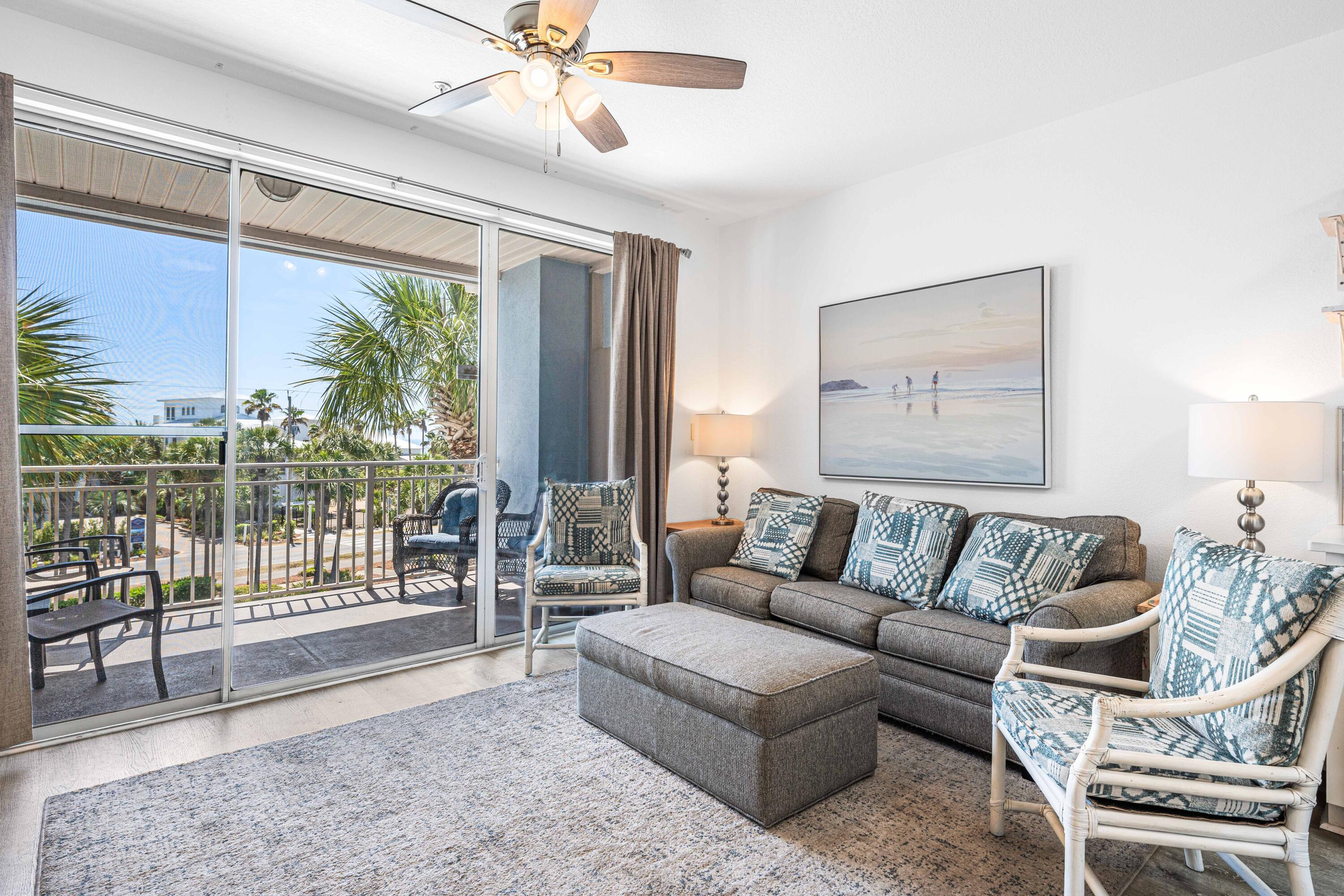 145 Spires Lane, Unit 306 Santa Rosa Beach, FL 32459 - Photo 5 of 35 a living room with furniture and a large window